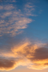 Wall Mural - abstract background of defocused blurred flame clouds in the sky
