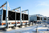 Fototapeta Koty - Sets of cooling towers in data center building.