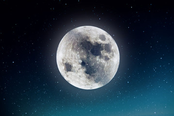 Photography of nightly sky with large moon and stars