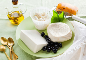 group of white cheeses: ricotta, Sicilian primosale and sheep ch