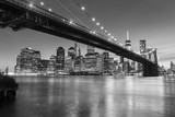 Fototapeta Nowy Jork - Brooklyn Bridge at dusk viewed from the Brooklyn Bridge Park in New York City.