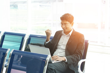 Wall Mural - Asian Indian businessman using laptop computer