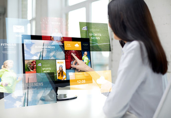 Wall Mural - close up of woman with news on computer in office