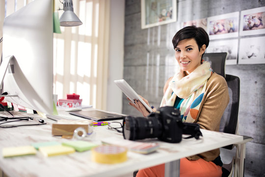 Business woman in designers studio at work
