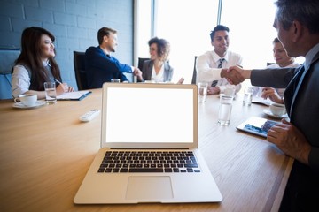 Aufkleber - Businesspeople having a discussion in conference room