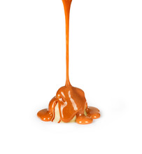 Caramel Falling On Cookies On A White Background