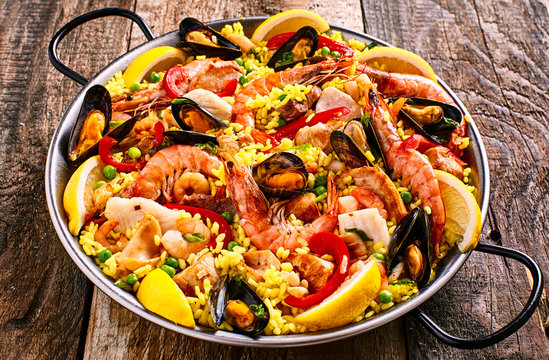 colorful seafood paella dish with shellfish