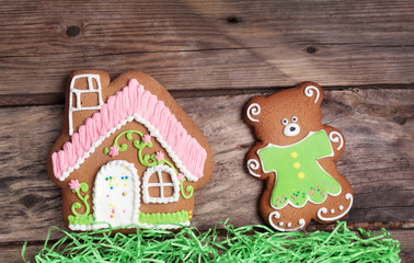 Composition with gingerbread house and Teddy bear 