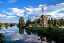Traditional Dutch Windmill Near The Lake In Amsterdam,Netherlands 