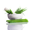 Green Chive in Pestle and Mortar on White