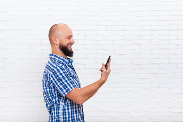 Poster - casual bearded man using cell smart phone happy smile