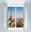 Window with Eiffel tower and roofs view