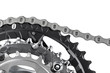 bicycle chain on gear of crank set isolated on white background