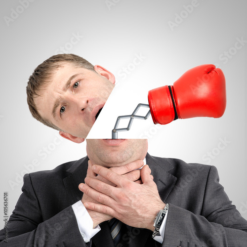 Fényképezés Boxing glove beating from businessmans head