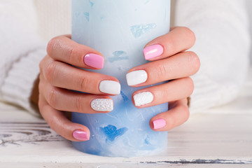 Fotomurales - Delicate white-pink female manicure.
