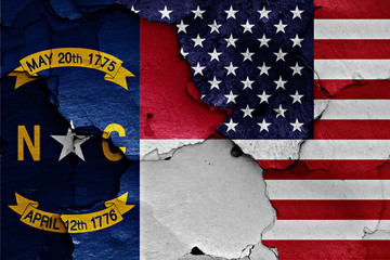 Sticker - flags of North Carolina and USA painted on cracked wall