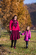 © mintybear - Mother and daughter in the park.happy mother and daughter in the autumn park