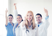 Group Of Doctors Showing Thumbs Up