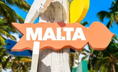 Wall Mural - Malta signpost with palm trees