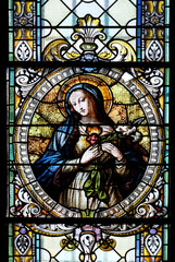 Wall Mural - Immaculate heart of Mary, stained glass window in Cathedral of St Nicholas in Novo Mesto, Slovenia 