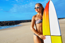 Summer Adventure. Water Sports. Surfing. Sexy Sporty Surfer Girl With Fit Body In Bikini With Surfboard Enjoying Holidays Travel Vacation On Beach. Healthy Active Lifestyle. Leisure Sport. Summertime