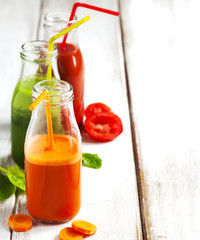 Wall Mural - Fruits and vegetable juice in bottle.