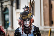 Venice - February 6, 2016: Colourful carnival mask through the streets of  Venice and in St. Mark's Square during celebration of the most famous carnival in the world. 
