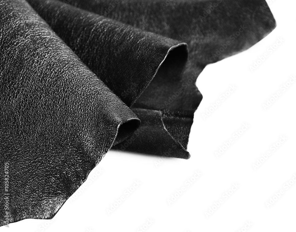 Black leather texture on white background, close up