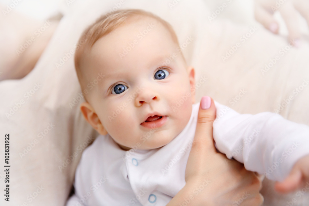 Cute baby with mother, close up