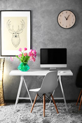 Sticker - Stylish working place with computer and wooden table.