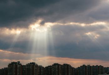 Wall Mural - Rays of the sun breaking through the clouds
