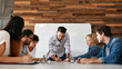 © Jacob Lund - Group of colleagues having a brainstorming session