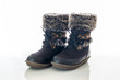 Winter female boot with fur isolated over white
