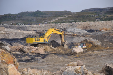 Wall Mural - scraping off the overburden  at an open cast coal mine, West Coast, New Zealand