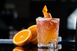 Fresh cocktail with orange and ice. Alcoholic, non-alcoholic dri