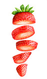 Fototapeta Koty - Falling sliced strawberry isolated on white