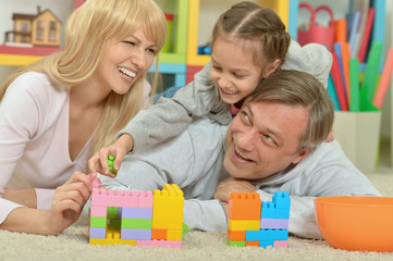 Canvas Print - happy family playing at home