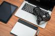 © sorapop - DSLR digital camera with tablet and notebook laptop