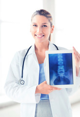 Sticker - female doctor with x-ray on tablet pc