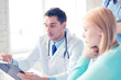 © Syda Productions - male doctor with patient