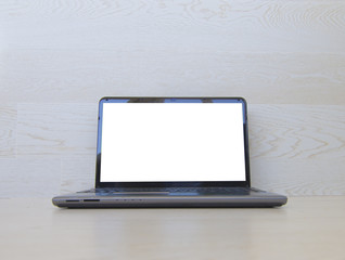Poster - Laptop with blank screen and wooden background