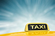 taxi sign on blue abstract background