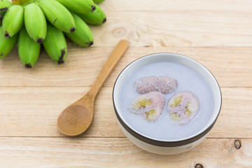 Wall Mural - Banana in coconut milk (Kluay Buad Chee), Thai desert.