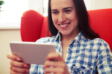 Poster - woman using interesting app on her smartphone