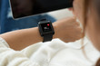 © DragonImages - Woman checking heart rythm with application on her phone