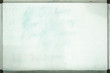 Old whiteboard for office with traces of stains and spots