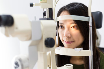 Poster - Patient during an eye examination at the eye clinic