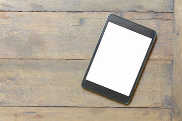 Black electronic device on wooden table