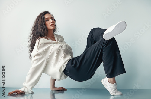 Fényképezés Fashion beautiful woman posing on the floor