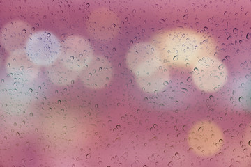Wall Mural - Water drop on mirror glass plate with bokeh abstract soft pink b